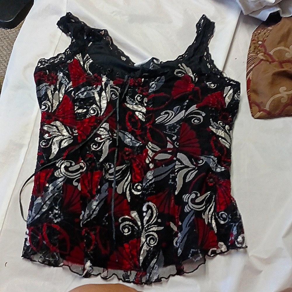 A blouse from Studio 1940 that is small